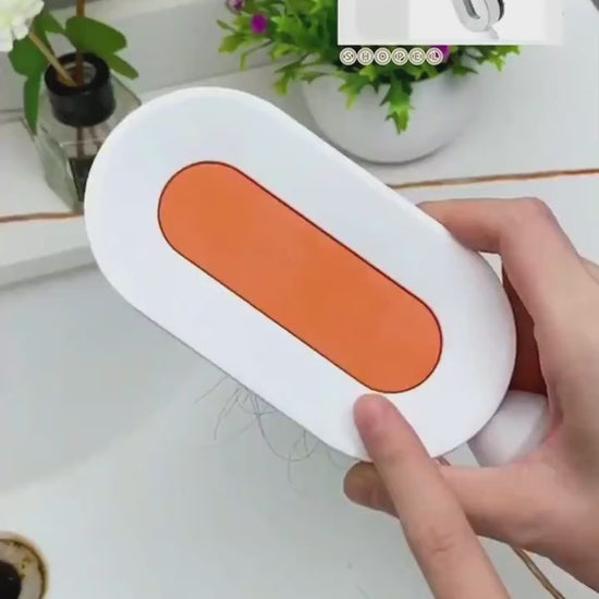 Hair being effortlessly removed from a self cleaning anti static hairbrush