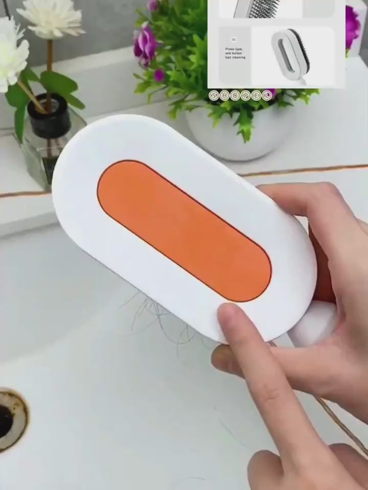 Hair being effortlessly removed from a self cleaning anti static hairbrush